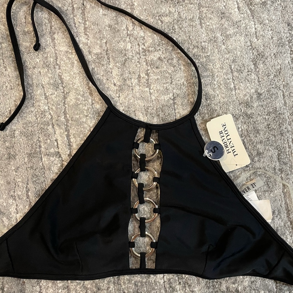 Black halter neck bikini top with silver details